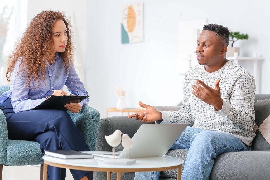 Psychologist,Working,With,African-american,Man,In,Office