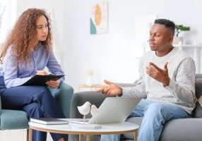Psychologist,Working,With,African-american,Man,In,Office